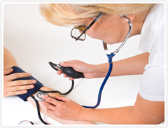 Medical Assistant Taking Blood Pressure